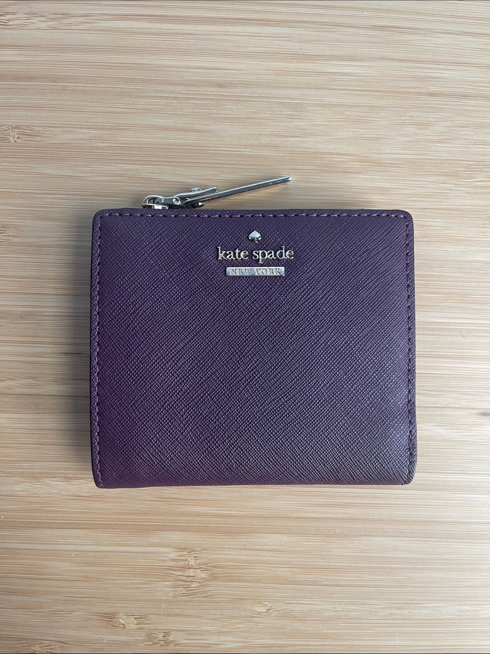 kate spade plum compact zip wallet